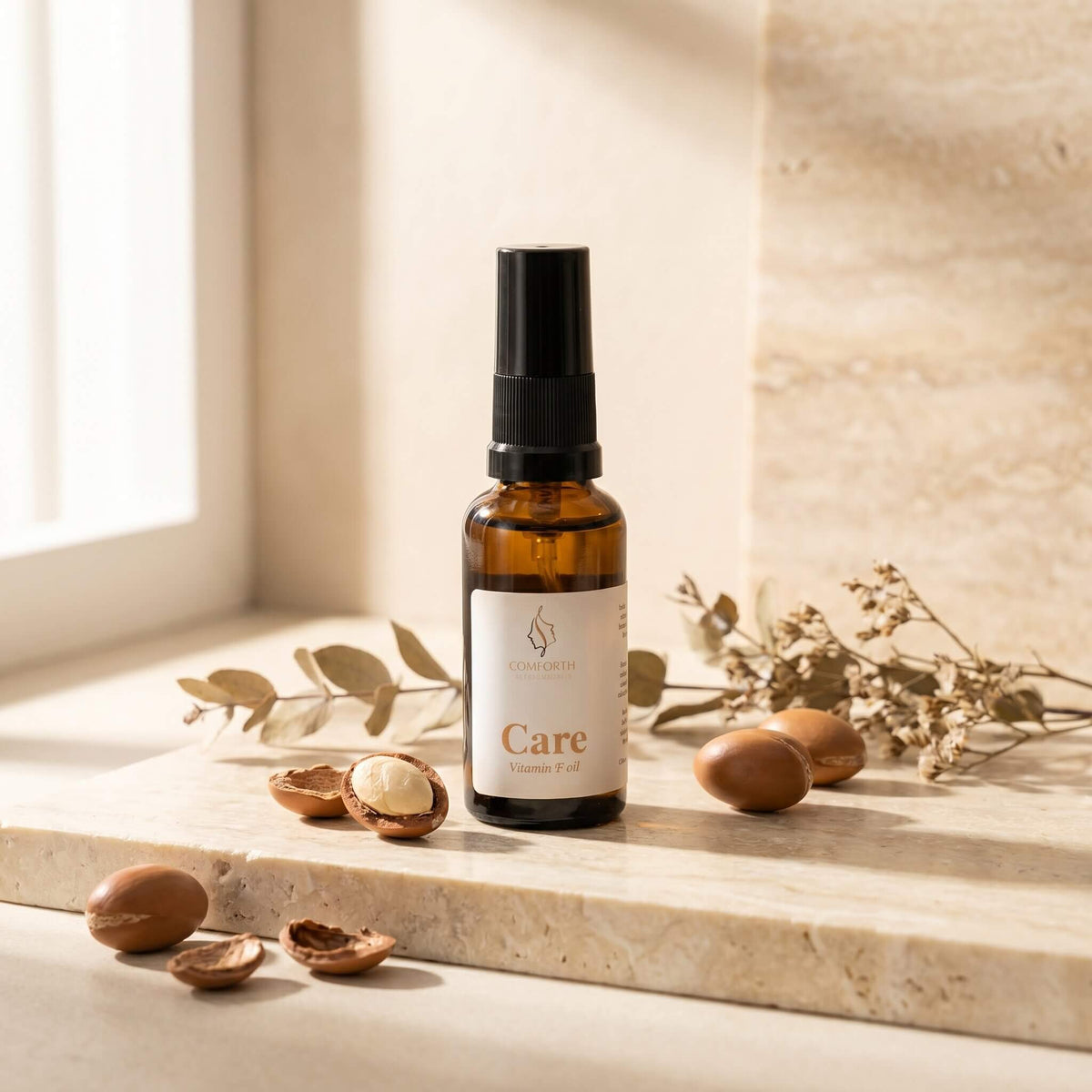 Comforth Care Vitamin F Oil ansiktsolja med nötter på stenhylla